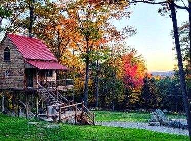 Unique Treehouse Accommodation for a Secluded Granite Lake Getaway - glamping.directory