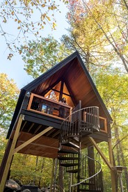 Eco-Friendly Solar Powered A-Frame Treehouse with Hot Tub and Private Dock  on Littlefield Pond, near Wells, Maine - glamping.directory
