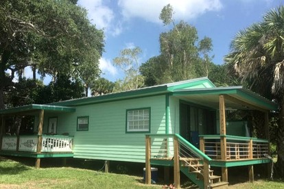 Beautiful Waterfront Cottage for a Peaceful Romantic Escape in Micco, Florida - glamping.directory