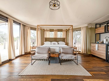 Beautiful Glamping Lodge with Mini-Bar and Fire Pit for an Unforgettable Escape in Stonewall, Texas - glamping.directory