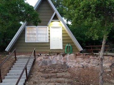 Cozy Lakefront A-Frame Cabin with Dock Access & BBQ Near Lake Cisco, TX - glamping.directory