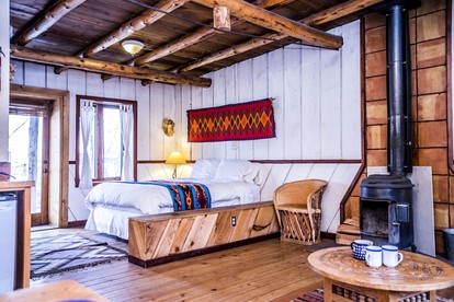 Rustic Log Cabin on Eco-Friendly Farm near Taos, New Mexico - San Cristobal, New Mexico - glamping.directory