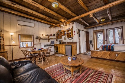 Rustic Log Cabin on Eco-Friendly Farm near Taos, New Mexico - San Cristobal, New Mexico - glamping.directory