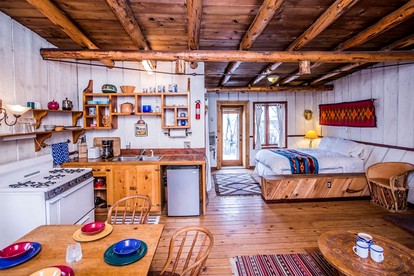 Rustic Log Cabin on Eco-Friendly Farm near Taos, New Mexico - San Cristobal, New Mexico - glamping.directory