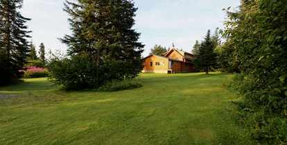 Unique Log Cabin Rental with Stunning Mountain Views in the Kenai Peninsula, Alaska - Anchor Point, Alaska - glamping.directory