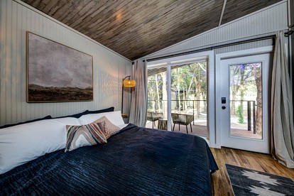 Serene Woodland Cabin Oasis near Trinity River in Texas - Alvord, Texas - glamping.directory