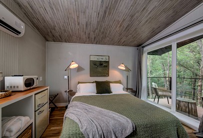 Serene Woodland Cabin Oasis near Trinity River in Texas - Alvord, Texas - glamping.directory