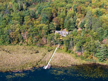 Incredible Lakefront Family Cabin with Boat Dock and Pontoon on Osprey Lake, Wisconsin - Hayward, Wisconsin - glamping.directory