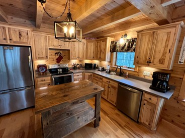 Wooden Lake Cabin Loaded with Kayaks in Maine - Greenville, Maine - glamping.directory