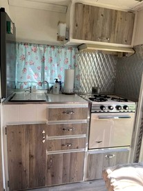 Charming Vintage Shasta Camper with Riverside Glamping Charm Near Pavilion Food Truck Scene in Mayhill, New Mexico - Mayhill, New Mexico - glamping.directory