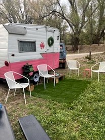 Charming Vintage Shasta Camper with Riverside Glamping Charm Near Pavilion Food Truck Scene in Mayhill, New Mexico - glamping.directory