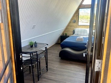Secluded Romantic A-Frame Tiny Home with Stargazing Deck near Grand Canyon, Meadview, Arizona - Meadview, Arizona - glamping.directory