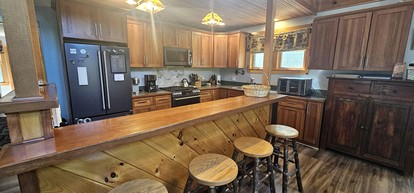 Group Cabin with Pool Table, Spa and Many More Amenities in Maine - Beaver Cove, Maine - glamping.directory