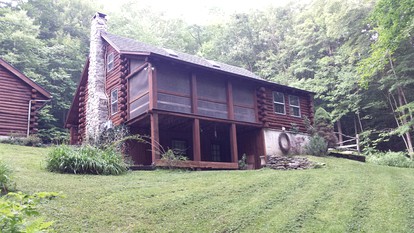 Log Cabin Rental for Eight Guests with Walk-Out Bedroom near Manchester, Vermont - glamping.directory