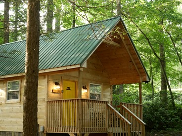 Two Cozy Cabins Nestled in the Trees for a Peaceful Group Getaway near the Great Smoky Mountains National Park in Tennessee - glamping.directory