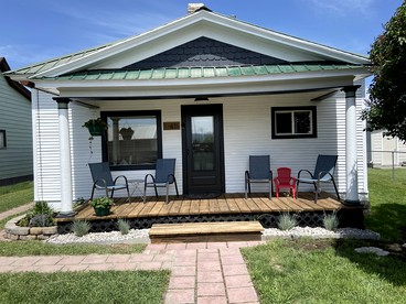 Charming Downtown Cottage with Porch & Backyard Retreat near Beaverhead River in Dillon, Montana - glamping.directory
