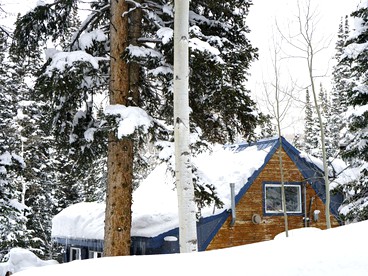 Gorgeous Cabin Rental in the Peaceful Pine Woodlands of Brighton, Utah - glamping.directory