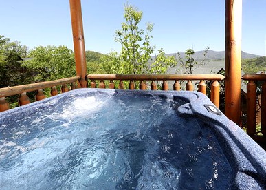 Dog-Friendly Log Cabin Rental with a Private Hot Tub near Sevierville, Tennessee - Sevierville, Tennessee - glamping.directory