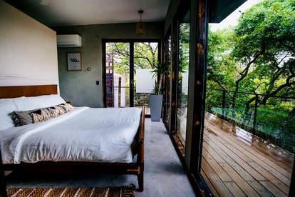 Design Tiny Cabin with Outdoor Bath and Hot-Tub in Texas - Marble Falls, Texas - glamping.directory