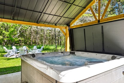 Design Cabin with Jacuzzi and Porch in Sister Bay, Wisconsin -  Sister Bay, Wisconsin - glamping.directory