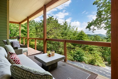 Luxurious Mountain Retreat with Wrap-Around Porches and Hot Tub, Near Asheville and Black Mountain, NC - glamping.directory