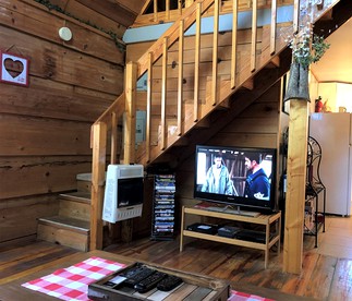 Romantic Log Cabin with Hot Tub near Cherokee National Forest, Tennessee - Coker Creek, Tennessee - glamping.directory