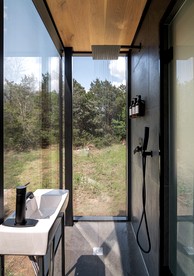 Whimsical Flower-Inspired Mirror Cabin by the Lake in the Enchanted Forests of Texas - Bastrop , Texas - glamping.directory