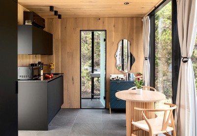 Whimsical Flower-Inspired Mirror Cabin by the Lake in the Enchanted Forests of Texas - Bastrop , Texas - glamping.directory