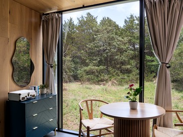 Whimsical Flower-Inspired Mirror Cabin by the Lake in the Enchanted Forests of Texas - Bastrop , Texas - glamping.directory