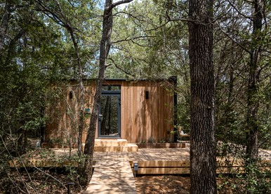 Whimsical Flower-Inspired Mirror Cabin by the Lake in the Enchanted Forests of Texas - Bastrop , Texas - glamping.directory