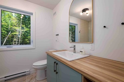 Stunning Cottage with Spa in the Woods in Baie-Saint-Paul, Quebec - Charlevoix, Michigan - glamping.directory