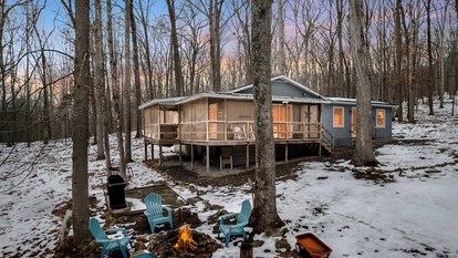 Dog Friendly Cabin with a Wood Burning Stove, Screened-In Porch, and River Access near Cacapon Resort State Park, WV - glamping.directory