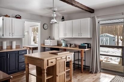 Dog Friendly Cabin with a Wood Burning Stove, Screened-In Porch, and River Access near Cacapon Resort State Park, WV - Great Cacapon, West Virginia - glamping.directory