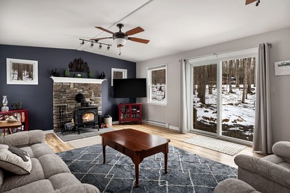 Dog Friendly Cabin with a Wood Burning Stove, Screened-In Porch, and River Access near Cacapon Resort State Park, WV - Great Cacapon, West Virginia - glamping.directory