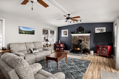 Dog Friendly Cabin with a Wood Burning Stove, Screened-In Porch, and River Access near Cacapon Resort State Park, WV - Great Cacapon, West Virginia - glamping.directory