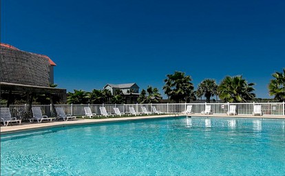Charming Cottage Rental with Private Balcony Overlooking Beach on Port Aransas, Texas - glamping.directory