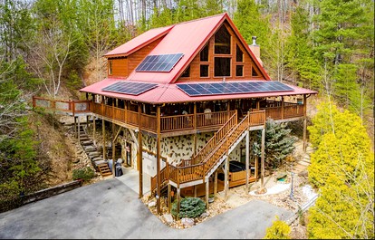 Incredible Family Cabin with Pool Table, Arcade Game, and Hot Tub for Luxury Getaway in Gatlinburg, Tennessee - glamping.directory