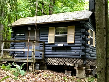 Cozy Log Cabin Rental for Two near the Wolf River in Elton, Wisconsin - glamping.directory