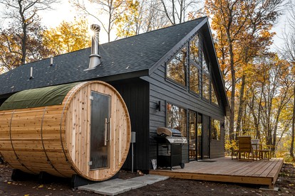 Riverside Retreat: Unwind in a Cabin with Private Steam Sauna on the Pine River - glamping.directory