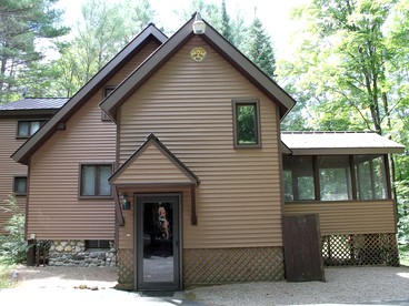 Family-Friendly Cabin on Trout Brook near Gore Mountain Ski Resort in Bakers Mills, New York - glamping.directory