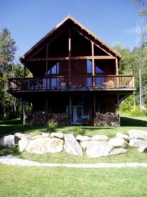 Enormous Cabin Rental Overlooking Spruce Lake in Wilmington, Vermont - glamping.directory