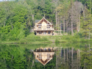 Enormous Cabin Rental Overlooking Spruce Lake in Wilmington, Vermont - Wilmington, Vermont - glamping.directory