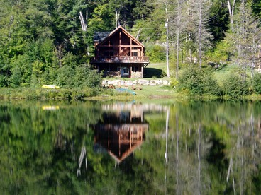 Enormous Cabin Rental Overlooking Spruce Lake in Wilmington, Vermont - Wilmington, Vermont - glamping.directory