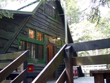 Riverfront Cabin Rental with Lovely Screened Porch near Potsdam, New York - glamping.directory