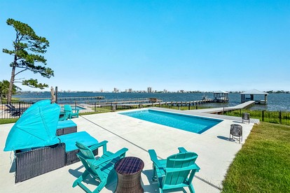 Luxurious Waterfront Lagoon Home with Heated Pool & Private Dock near Gulf Shores, Alabama - Gulf Shores, Alabama - glamping.directory
