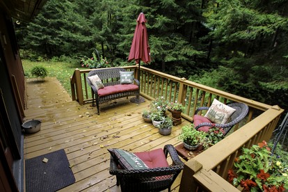 Cozy Cottage Surrounded by Trees with Private Dock for a Peaceful Escape by Big Moose Lake in New York - Webb, New York - glamping.directory