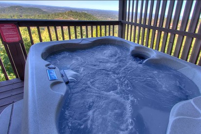 Extraordinary Smoky Mountain Cabin with Panoramic Views, Hot Tub & Arcade near Pigeon Forge and Gatlinburg, TN - Sevierville, Tennessee - glamping.directory