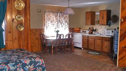 Cozy Wood Cottage Rental with Fireplace in White Mountains of Arizona - Lakeside, Arizona - glamping.directory