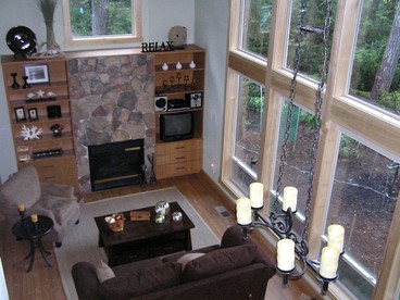 Rustic Cabin with a Pool and Hot Tub on Harstine Island in Washington - glamping.directory