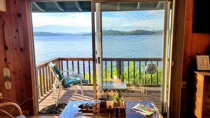 Scenic Lakeside Cabin with Exclusive Boat Dock Near Weirs Beach, Laconia, New Hampshire - Laconia, New Hampshire - glamping.directory